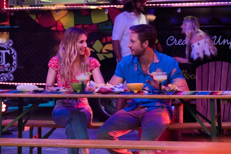 HOLIDATE (2020) L to R: Emma Roberts as Sloane Reed & Luke Bracey as Jackson Pieretti. Cr. Steve Dietl / Netflix